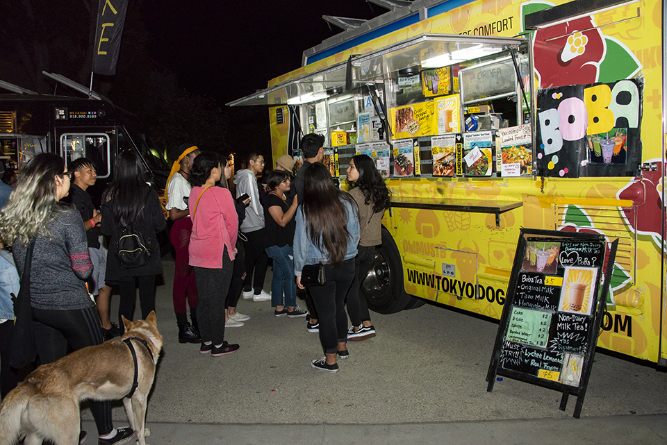 Students gathered around a food truck.