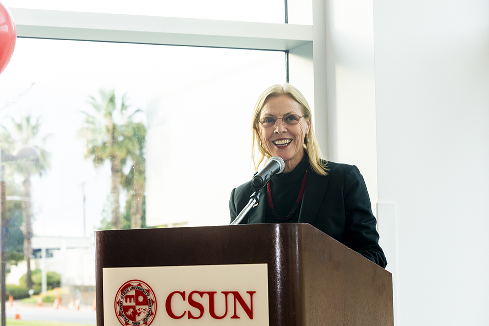 CSUN President Dianne F. Harrison speaks at the Lilac Hall opening.