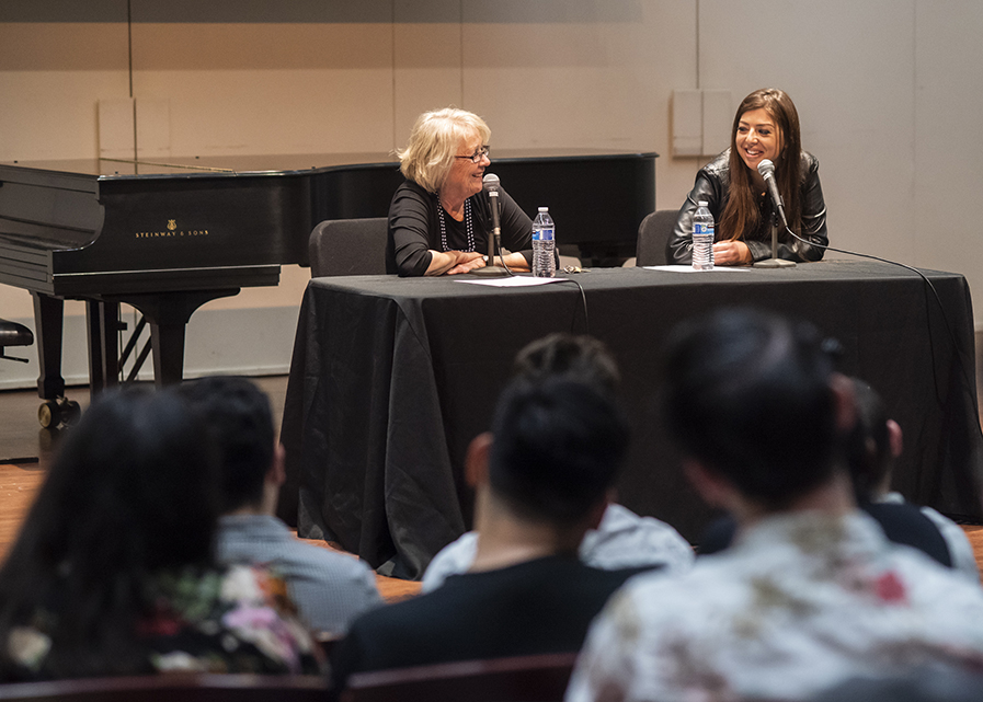 Elizabeth Sellers and Pinar Toprak talk on stage at a media composition Master Class at CSUN. 
