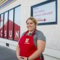 Christel Bowen stands in front of the CSUN Food Pantry's new location.