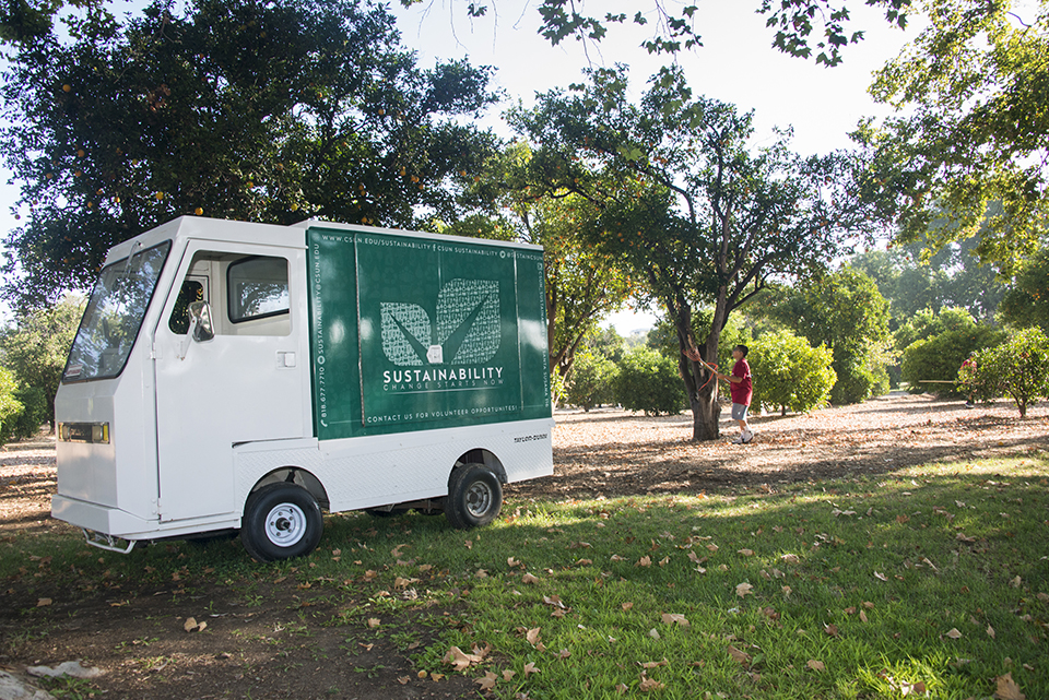 CSUN Sustainability cart parked in orange grove