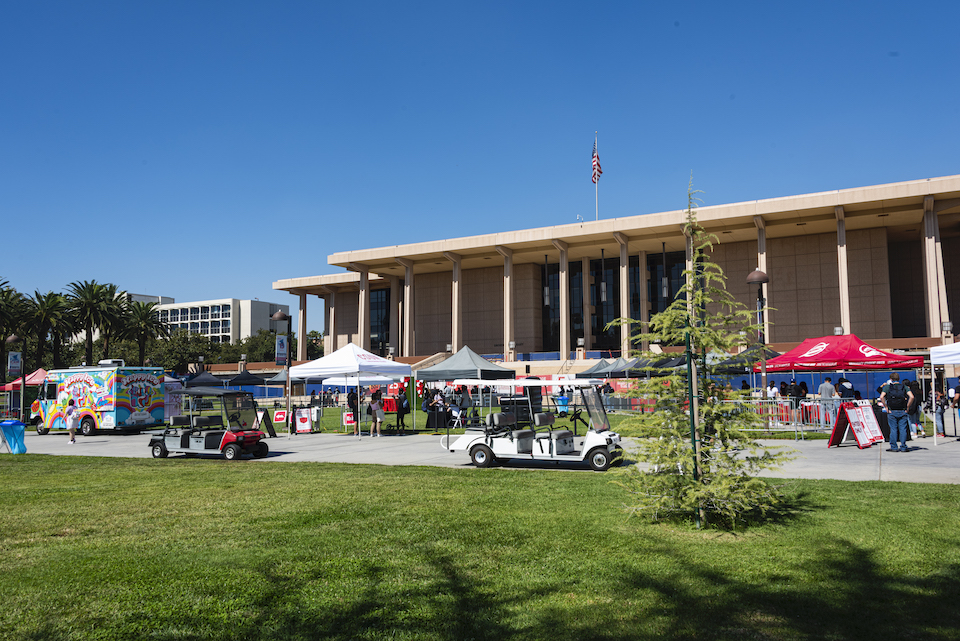 CSUN Library with Matador Experience Fair tents on lawn