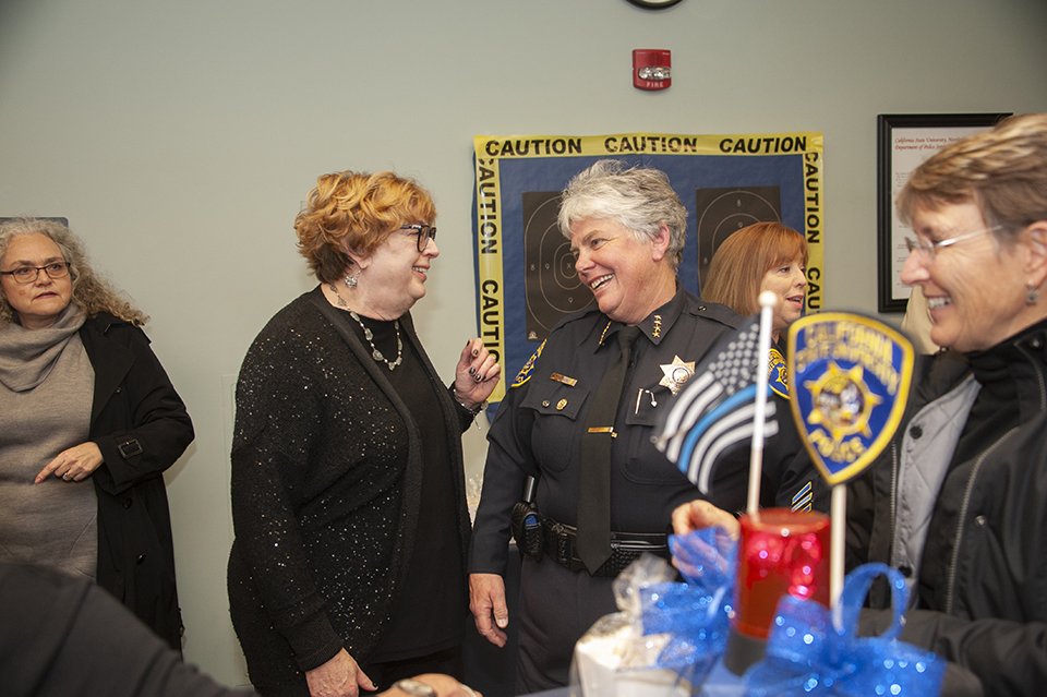 CSUN Police Chief Anne Glavin laughs while talking with Joyce Feucht-Haviar at her retirement reception.