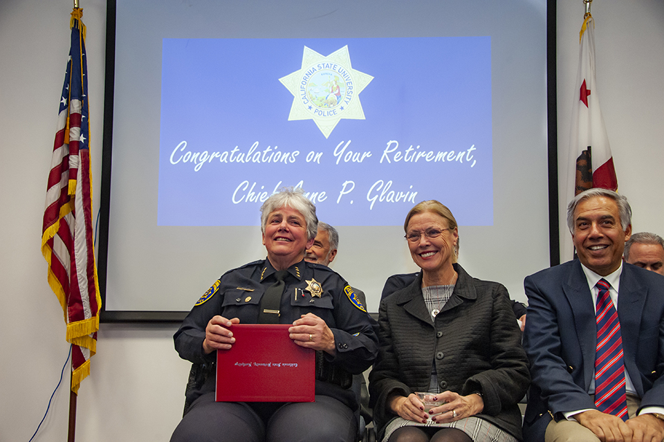 CSUN Police Chief Anne Glavin sits next to CSUN President Dianne F. Harrison and Mohammad Qayoumi at her retirement reception.