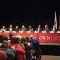 Ten candidates for the District 25 U.S. Congressional seat are seated at a CSUN table for a forum hosted by CSUN and College of the Canyons.