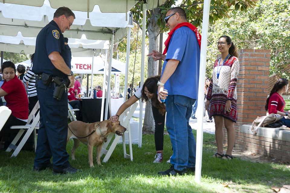 K9 Daisy makes friends at the 2018 President's Picnic.