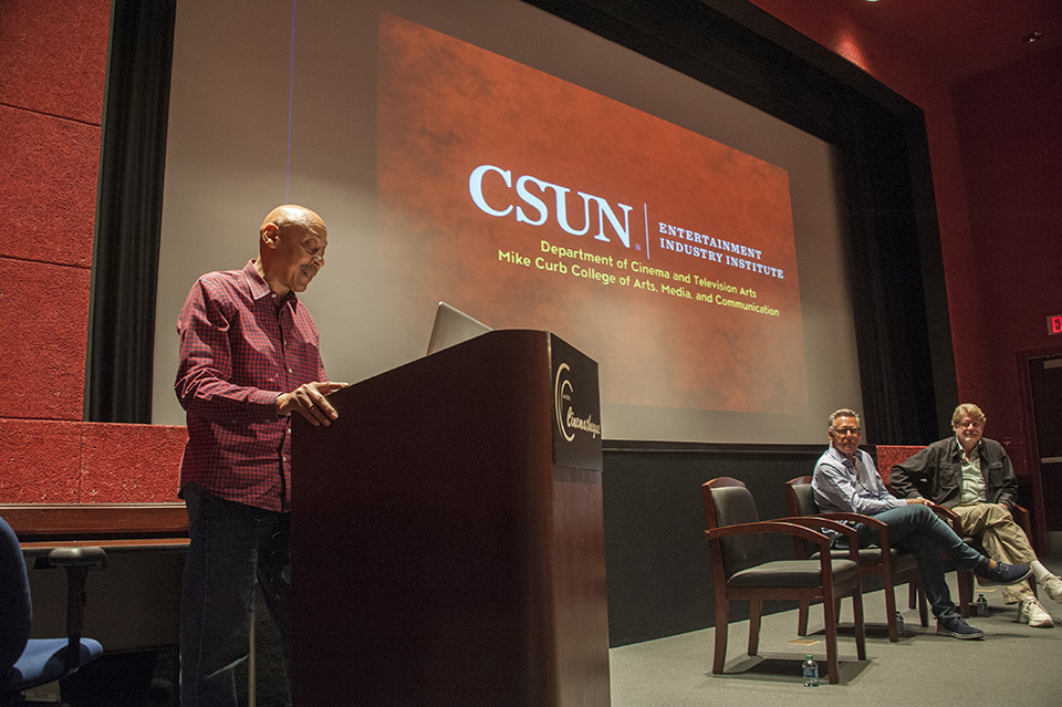 Left to right: Professor Nate Thomas, Micheal Grillo and Donald Petrie speak to an audience.