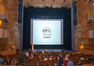 People gather in an auditorium to celebrate EOP's 50th Anniversary.