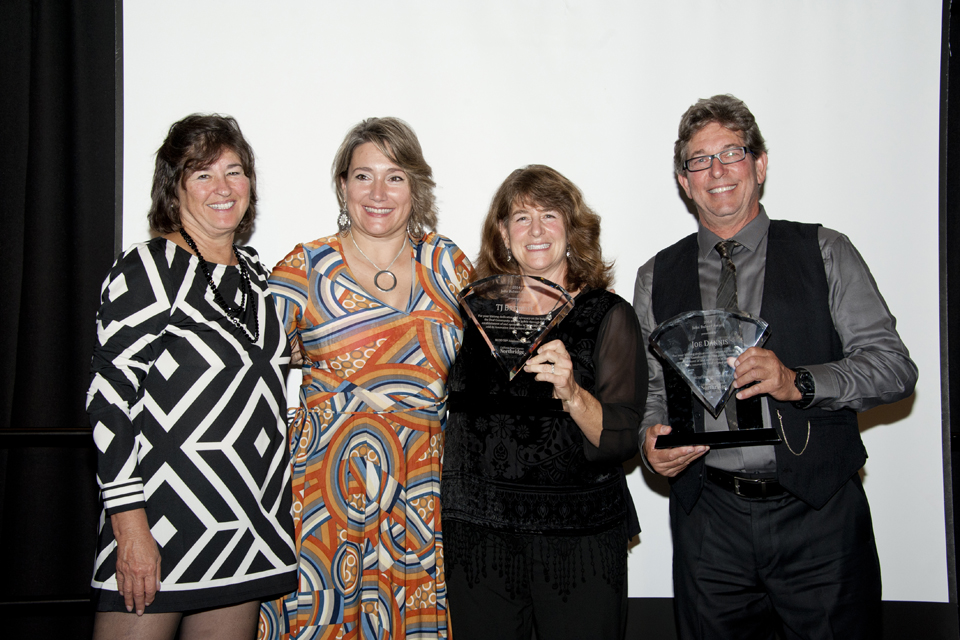 Roz Rosen and Julie Rems Smario pose with the recipients of the Jon Bulwer Award: Joe Dannis and T.J. Briendel