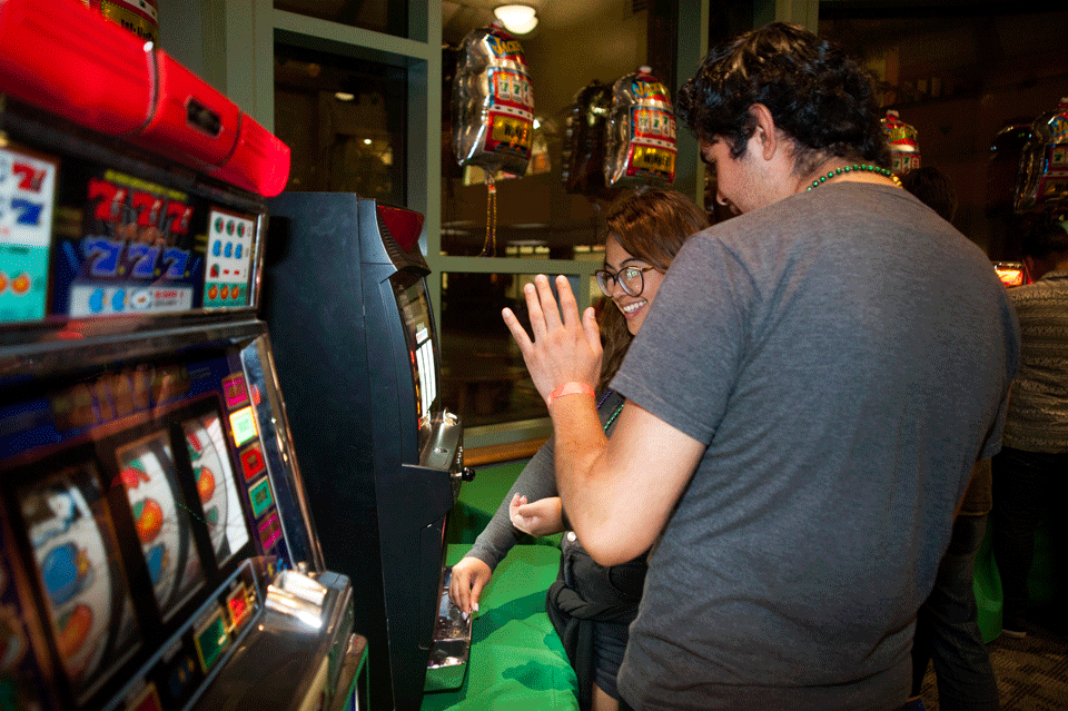 Two students playing casino games