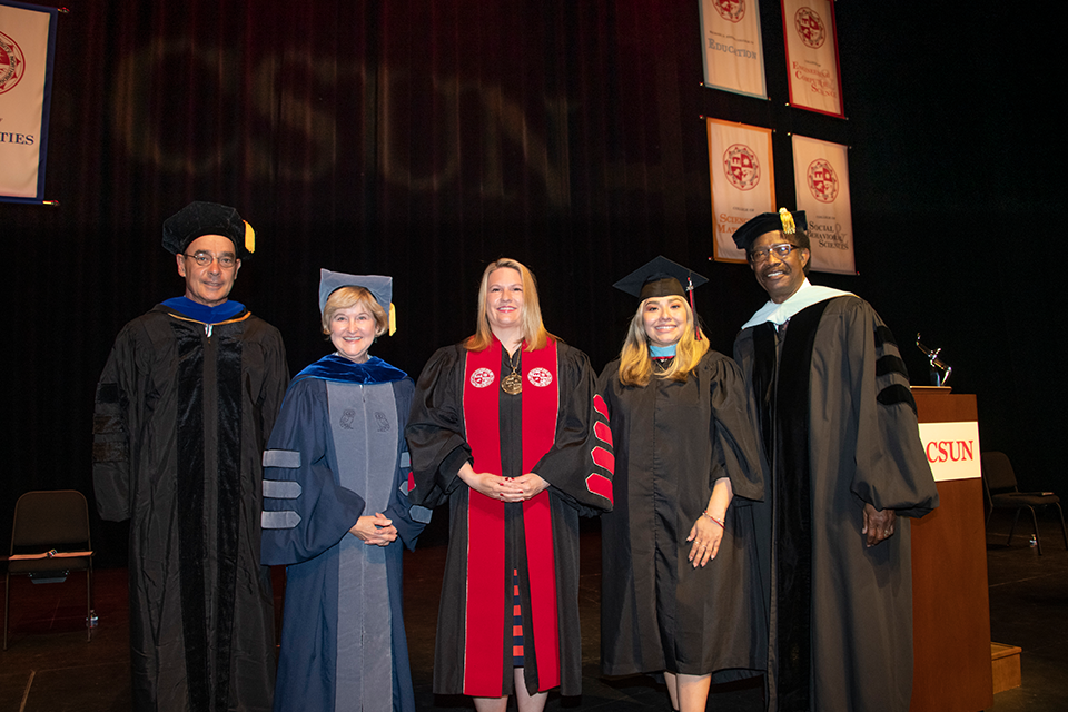 (Left to right) Faculty Senate president Michael Neubauer; Mary Beth Walker, provost and vice president for Academic Affairs; CSUN President Erika D. Beck; Associated Students President Rose Merida; and William Watkins, vice president for Student Affairs and dean of students at the all-university ceremony on May 15.