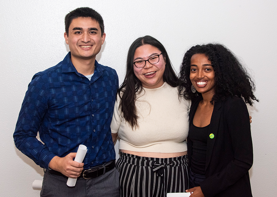 Thomas Parashos, Denise Nguyen and Helina Mekonnen of The Avocabros receive their awards for Best Data Visualization during the awards ceremony of DataJam 2019 at the University Student Union on Oct. 18.