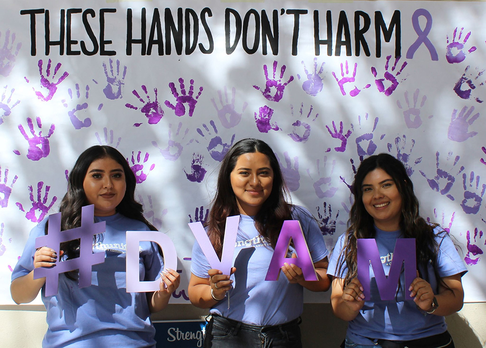 CSUN students share their message at a past event for Domestic Violence Awareness Month. Photo courtesy of Strength United.
