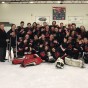 CSUN Ice Hockey Team smiles for a team photo after winning their third West Coast Hockey Conference championship for a third year in a row at the East West Ice Palace in Artesia, Calif. on Feb. 10.