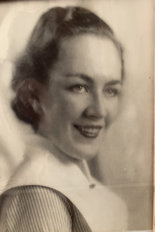 A portrait of a younger Eileen Keenan as a nurse.