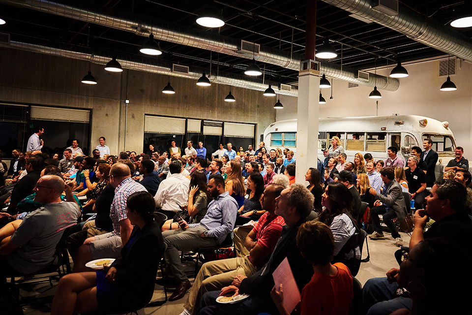 A room full of people sitting at Toolbox LA in the event space.