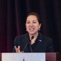 Lt. Gov. Eleni Kounalakis speaks at a podium.
