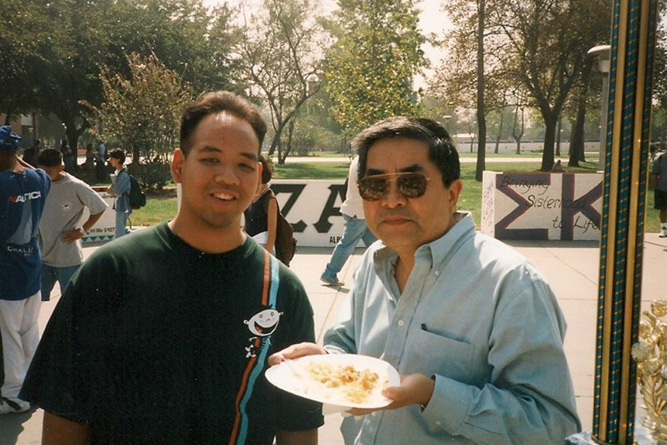 Former FASA president Moonie Lantion with inaugural department chair Kenyon Chan in fall 1997.