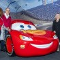 CSUN President Erika D. Beck, Michael Neubauer and Theresa White stand with Red Car known as Lightning McQueen in the Disney Pixar Films Cars.