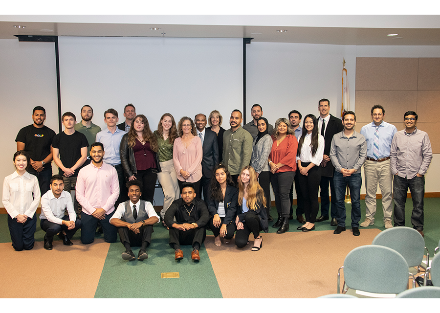 The eight finalist teams for the 2019 CSUN Fast Pitch competition come together for a group photo on Nov. 19.