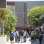 Students walking along pathway leading to the Student Recreation Center