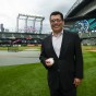 Fred Rivera stands on the field at T-Mobile Park in Seattle.
