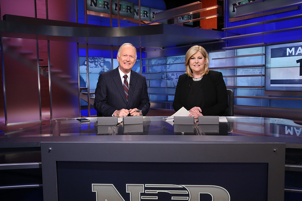 Alumni Bill Griffeth and Sue Herera on the set of Nightly Business Report.