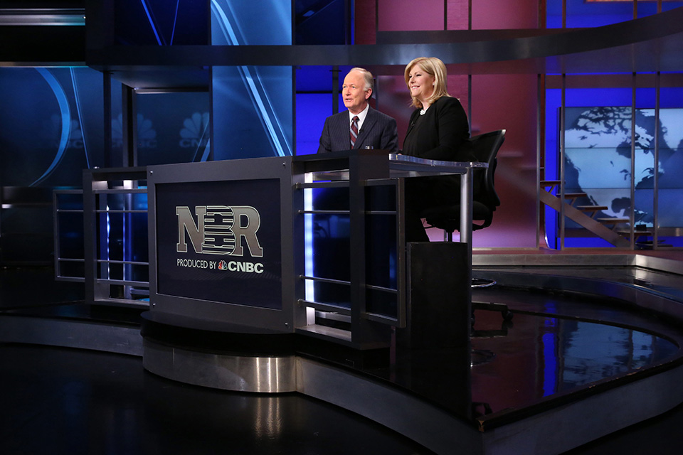 Bill Griffeth and Sue Herera at their Nightly Business Report desk.
