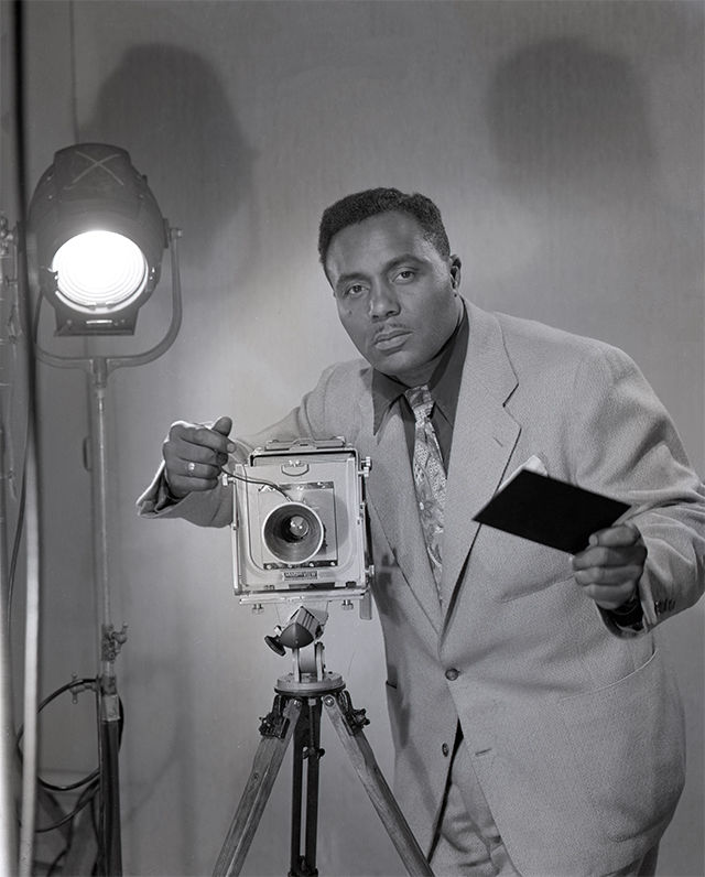 Harry Adams self-portrait using a studio light and camera on tripod.
