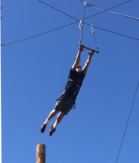 Student jumps to catch ring 30 feet above ground.