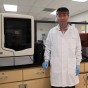 Bingbing Li, CSUN assistant professor of Manufacturing Systems Engineering, wears a face shield created in his lab. Li is using 3D printers to create more than 1,500 face shields for health care workers throughout Los Angeles.