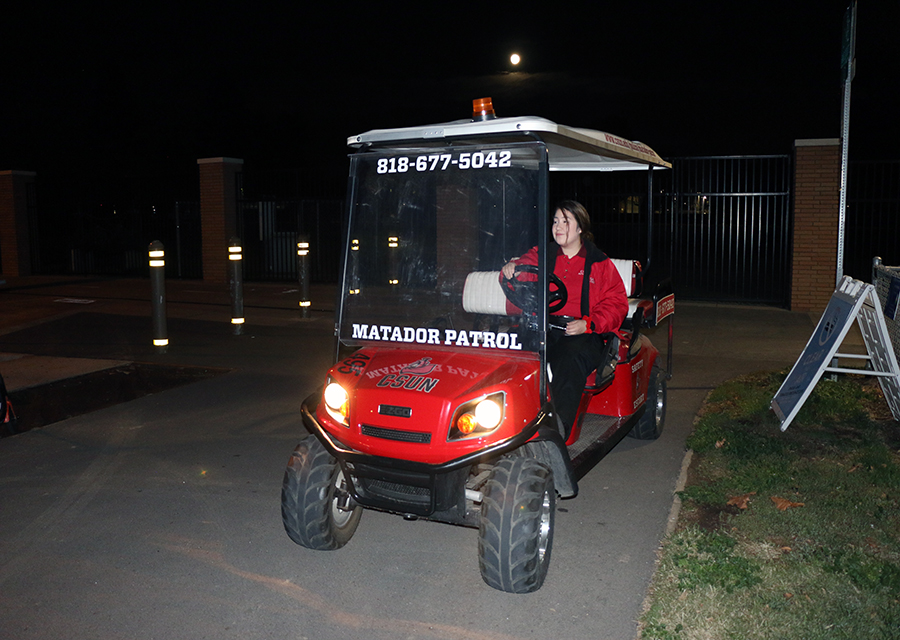 CSO Advisor Maria Martinez drives in her patrol cart looking for people to escort.