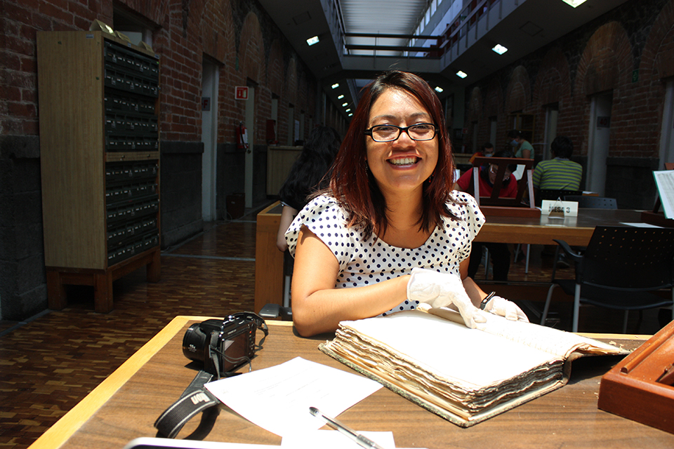 Chicana/o studies associate professor Xóchitl Flores-Marcial in the the archives of Museo Nacional de Antropología in Mexico. She has received a a prestigious Ford Postdoctoral Fellowship to complete her book, “Zapotec Gift: Guelaguetza, Mesoamerican Social Networks 1330-2020,” which will be the first of its kind to document the Zapotec tradition. Photo by Aaron Olives, courtesy of Xóchitl Flores-Marcial.