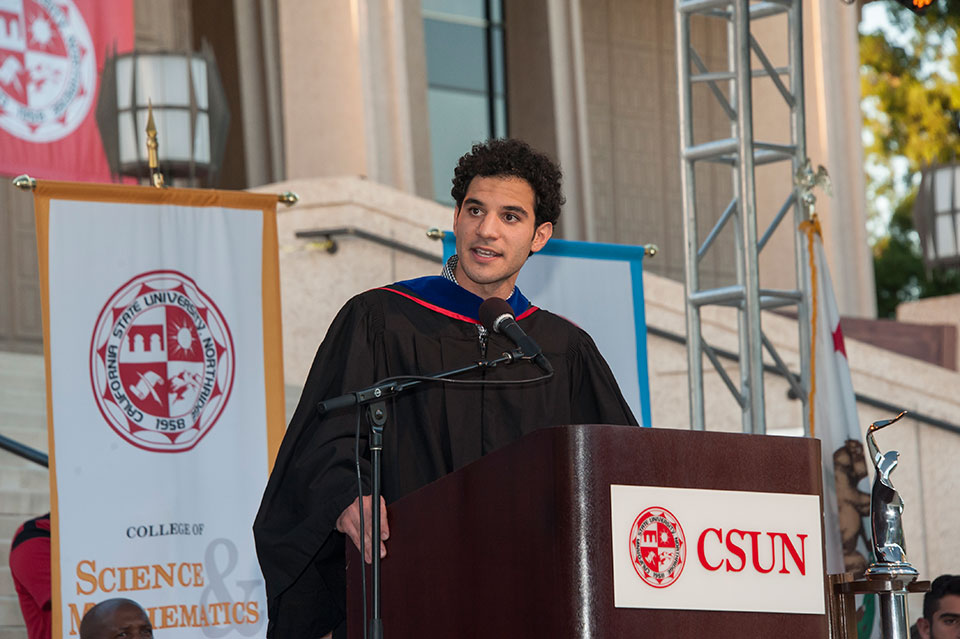 CSUN alumnus Joshua Khabushani, the 2016 recipient of the Outstanding Senior award, addresses freshmen.