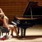 Karine Poghosyan Raises Fist While Playing Piano