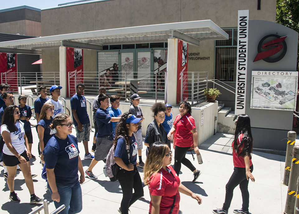 Dodgers RBI participants walking through the University Student Union.