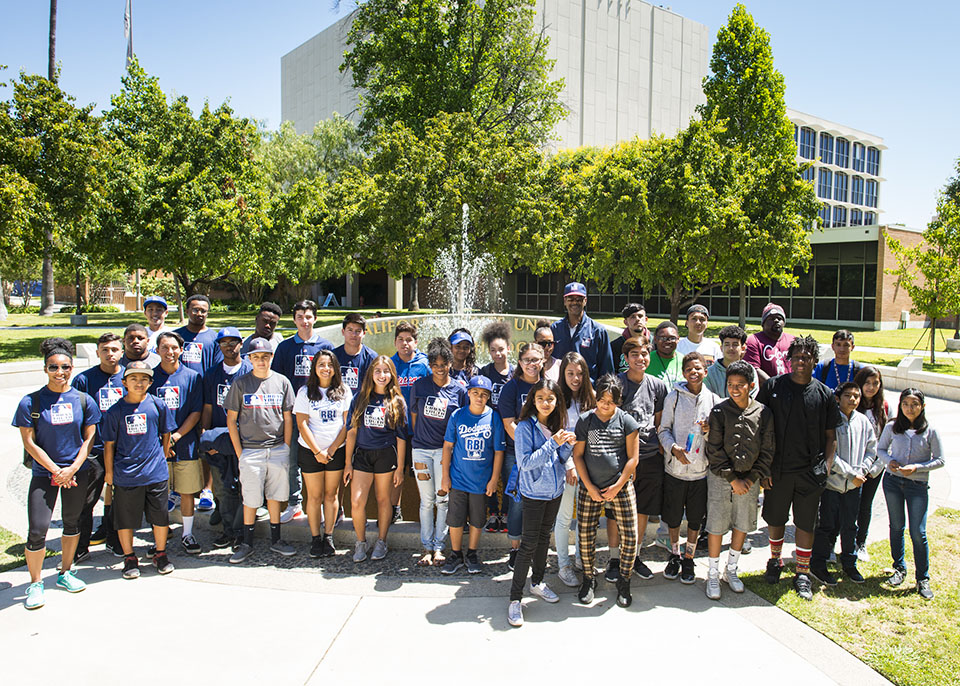 Dodgers RBI participants at the fountain by Bayramian Hall.