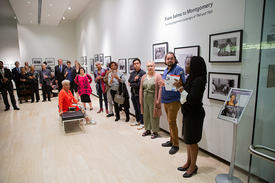 CSUN Africana studies professor Karin Stanford speaks at the exhibit “From Selma to Montgomery,” a series of photographs taken by social activist John Kouns.