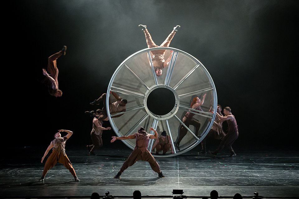 DIAVOLO dancers perform around a giant wheel at The Soraya.
