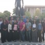 Gov. Linda Lingle and her class in front of bronze matador statue