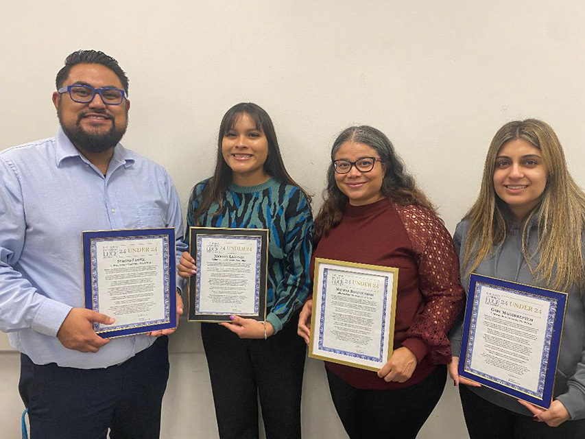 CSUN educational leadership and policy studies students have been recognized for their work to support an Indonesian shelter for teen mothers. From left to right, students Sergio Lopez, Jocelyn Lagunas, Melissa Baghoumian, Gabriela Mahgerefteh. Photo by Joshua Einhorn.