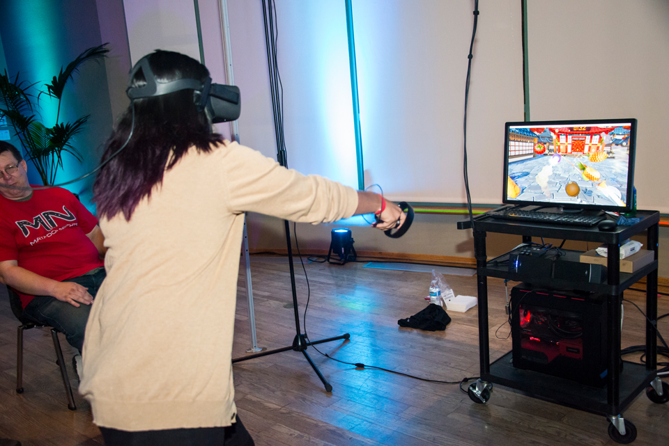 Person playing virtual reality game.