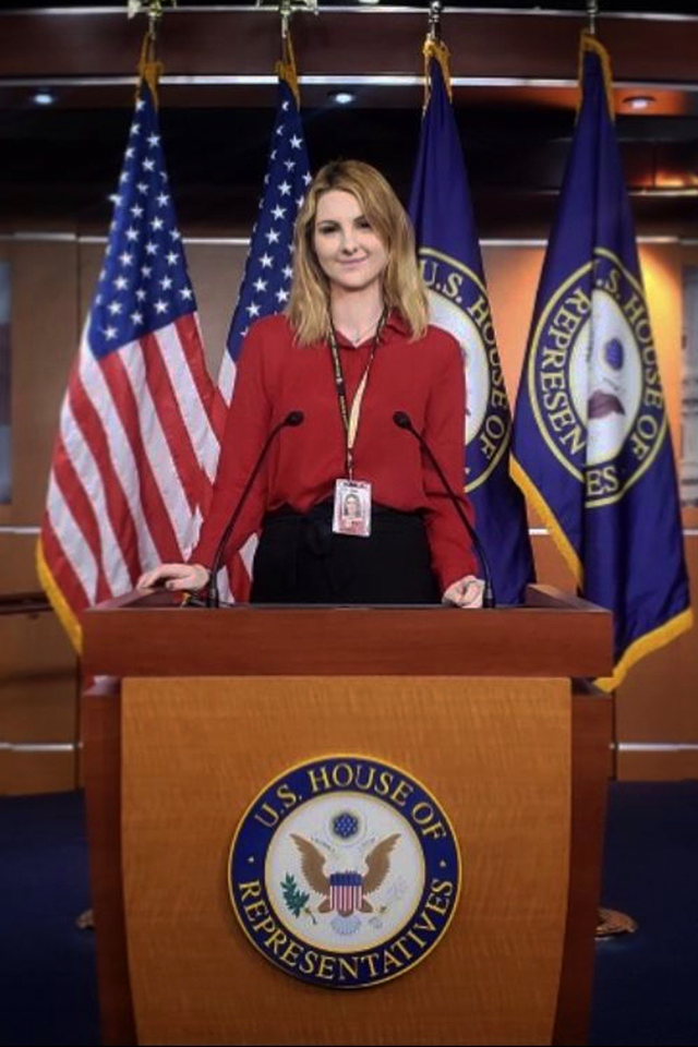 Makenna Sievertson at the podium of the U.S. House of Representatives Radio-TV Correspondents' Gallery.