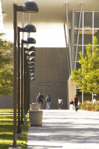 Manzanita Hall is seen in the distance from a walkway at the Sierra Quad.