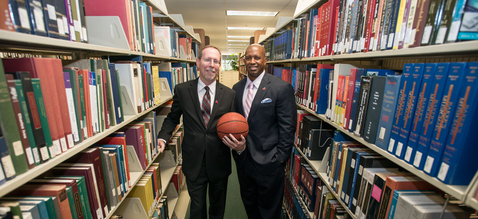 Stover and Martin in library.