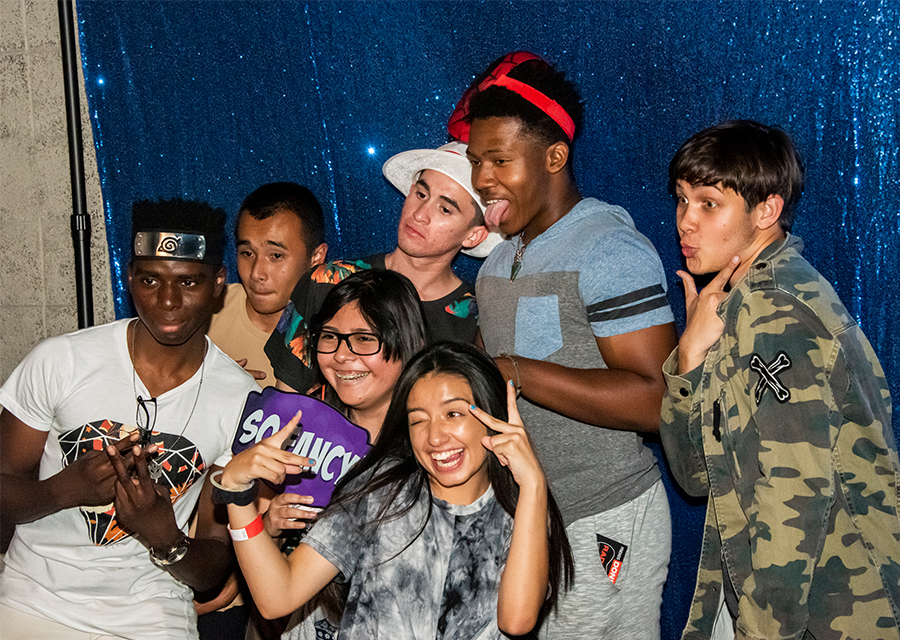 Students pose for a silly group photo at the photo booth during Matador Nights on Sept. 13 at the University Student Union.