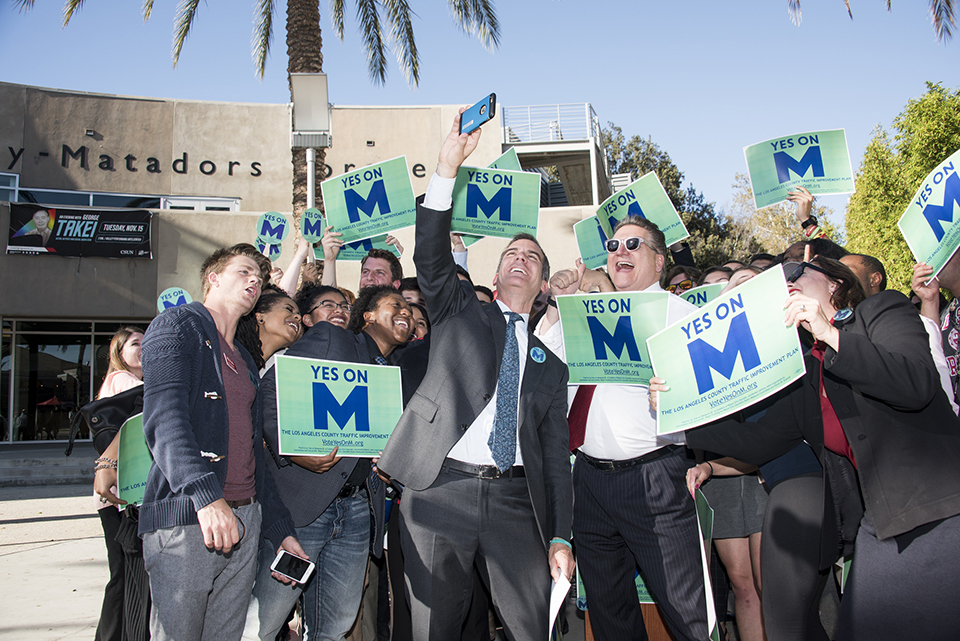 Group takes selfie with Measure M signs