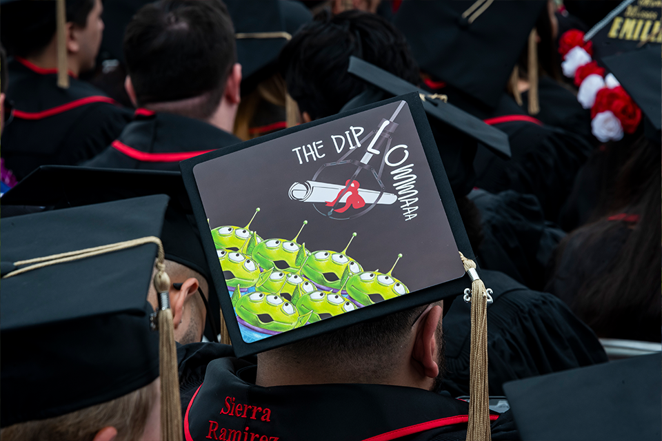 Mortarboard features the little green men from 