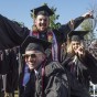 Students pose for photo at commencement