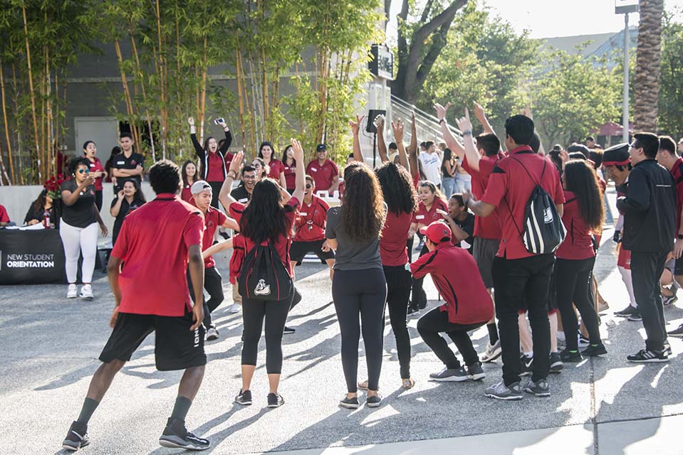 Every morning NSO leaders dance and cheer to welcome new Matadors. Photo by David J. Hawkins.